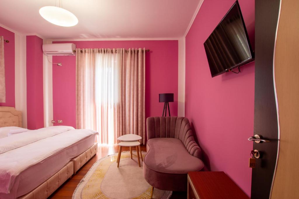 TV a/nebo společenská místnost v ubytování Bora Hotel