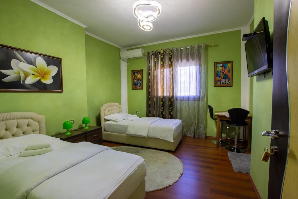 Postel nebo postele na pokoji v ubytování Bora Hotel