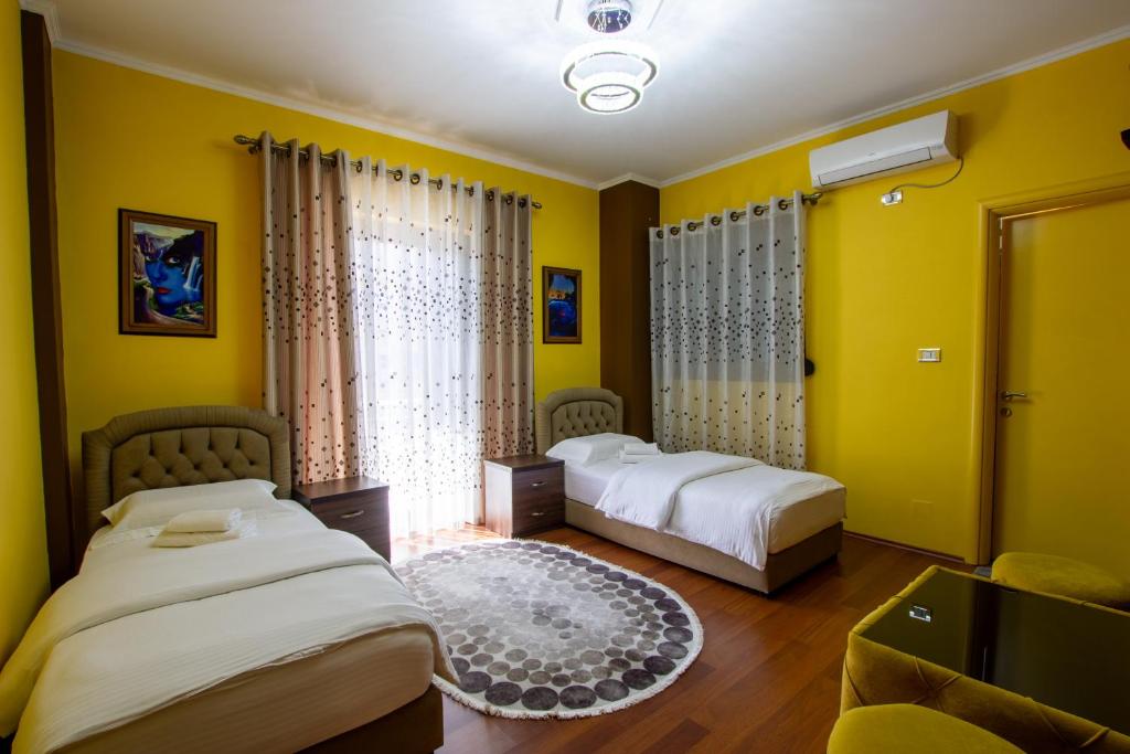Postel nebo postele na pokoji v ubytování Bora Hotel