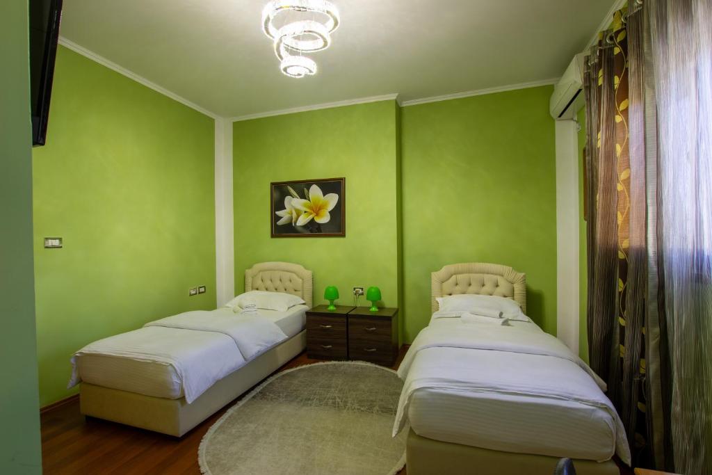 Postel nebo postele na pokoji v ubytování Bora Hotel