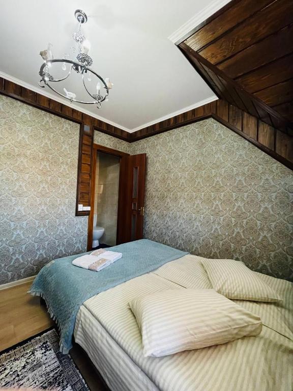 Postel nebo postele na pokoji v ubytování Чистий Спокій