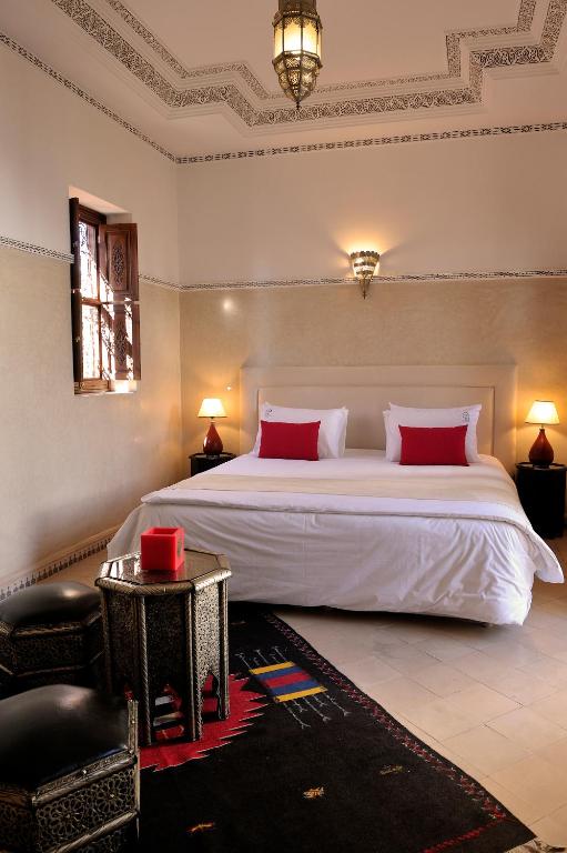 Letto o letti in una camera di Riad Le Jardin d'Abdou