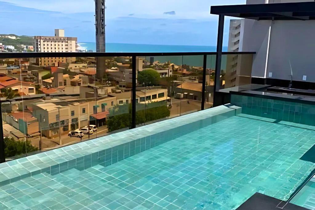A piscina localizada em Reserva Madero Loft Natal Hotel ou nos arredores