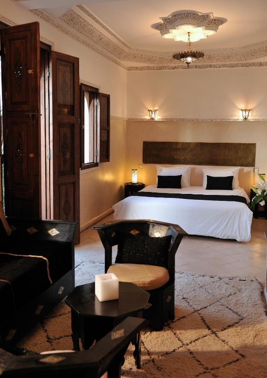 Letto o letti in una camera di Riad Le Jardin d'Abdou
