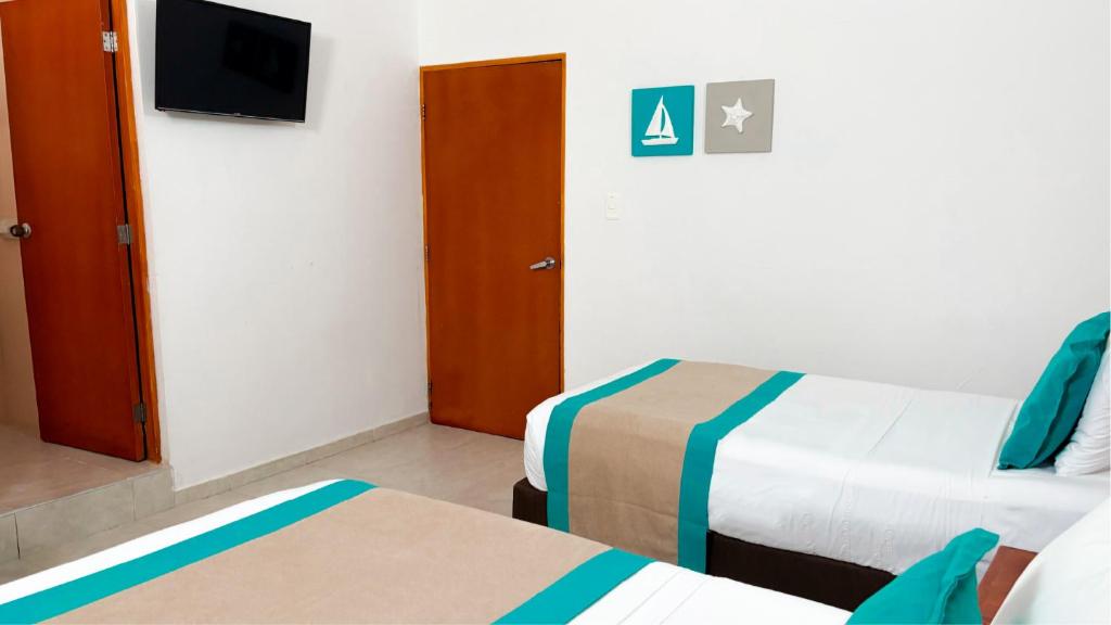 Hotel Portobelo beach - Habitación Triple