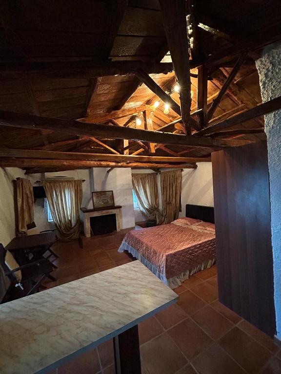 Postel nebo postele na pokoji v ubytování Δωμάτια Εξοχή