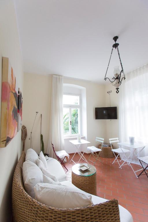 TV a/nebo společenská místnost v ubytování Albergo Garnì Villa Moretti