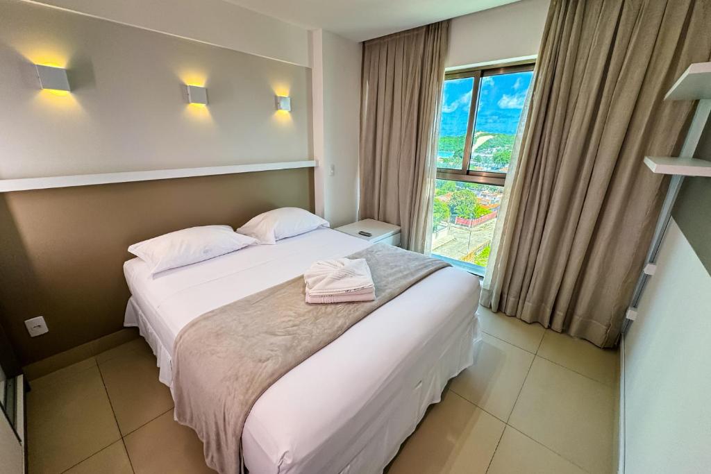 Letto o letti in una camera di Premium Flat Ponta Negra Natal