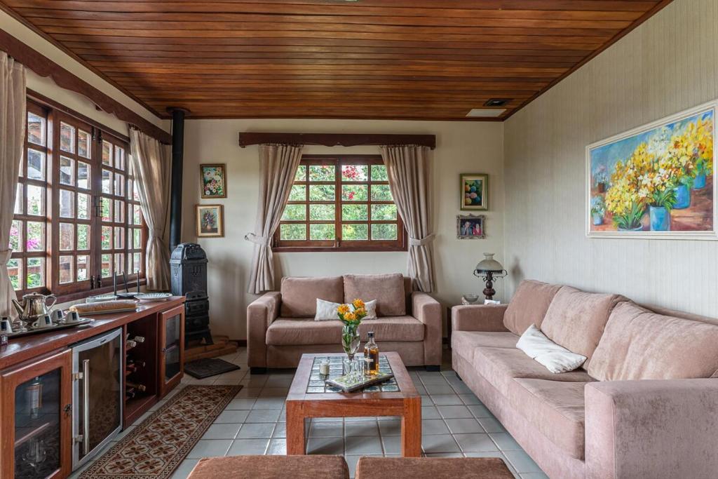 Et opholdsområde på Casa de campo em Gravatá, agradável e aconchegante