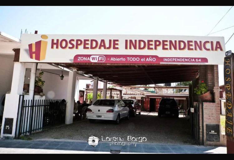 a car parked under a hosuedole independent at Independencia in Santa Rosa de Calamuchita