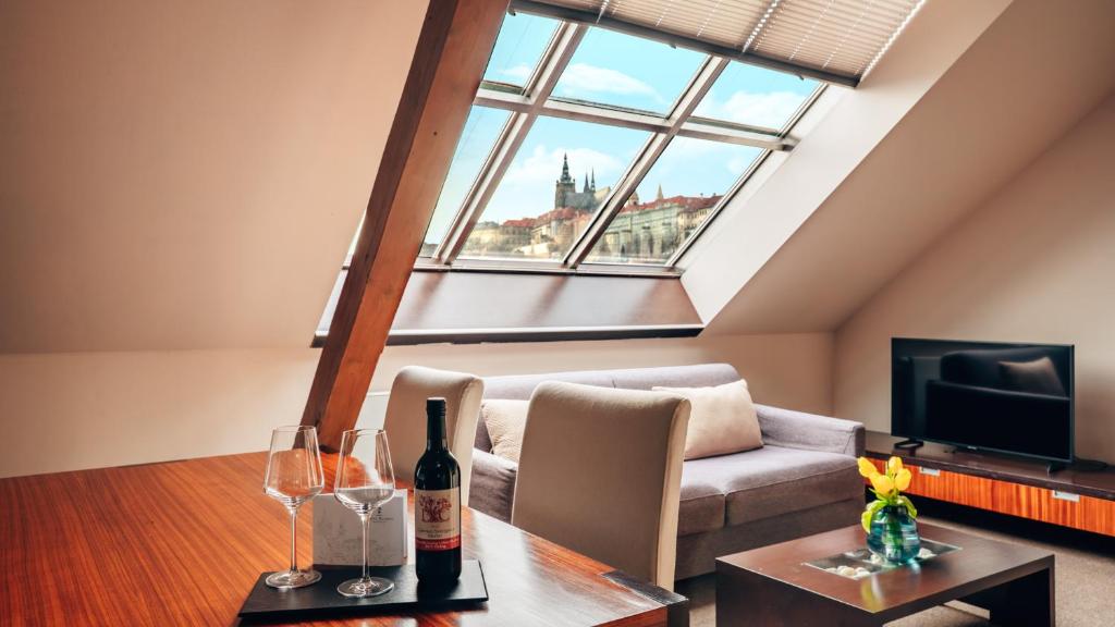 TV a/nebo společenská místnost v ubytování Boutique Hotel Klarov