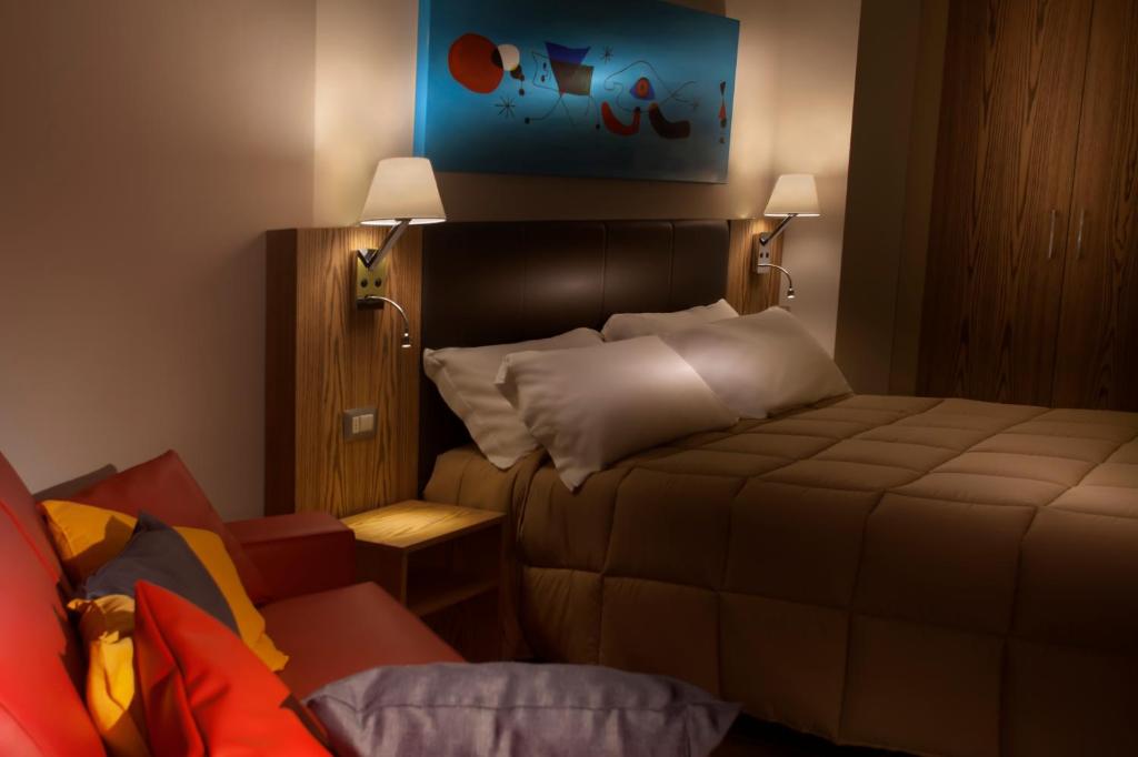 Cama ou camas em um quarto em La Maison D'Art