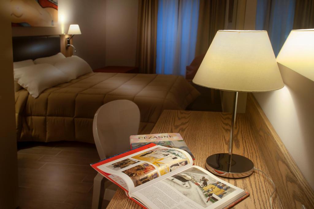 Cama ou camas em um quarto em La Maison D'Art