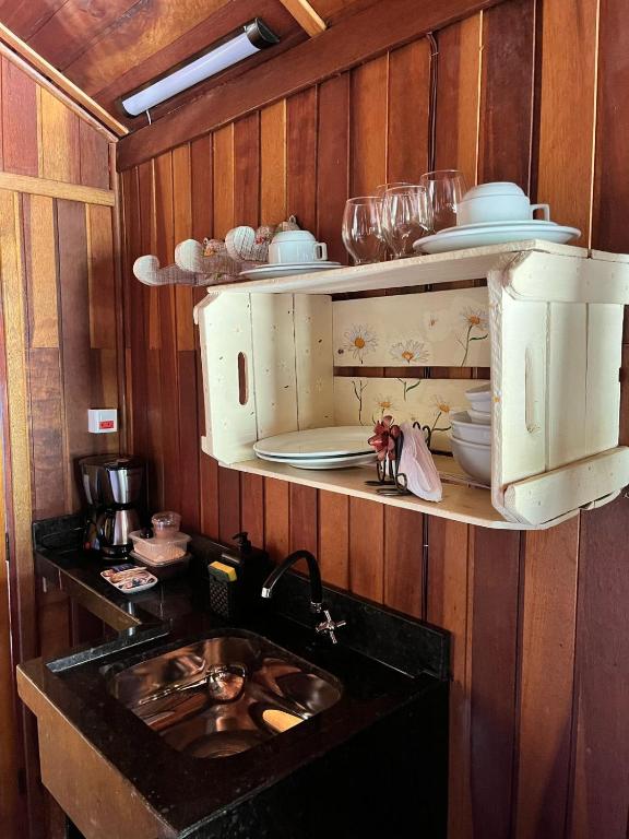 Kuchyň nebo kuchyňský kout v ubytování Chalé Represa Suite Varanda Do Sol