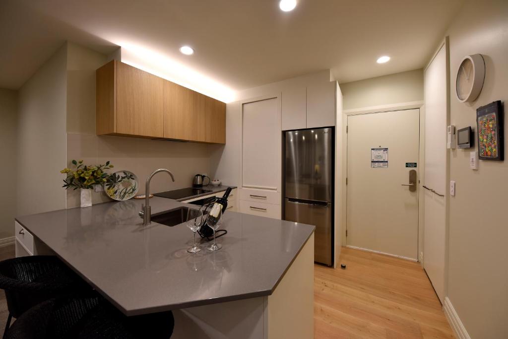 Kuchyň nebo kuchyňský kout v ubytování West Fitzroy Apartments