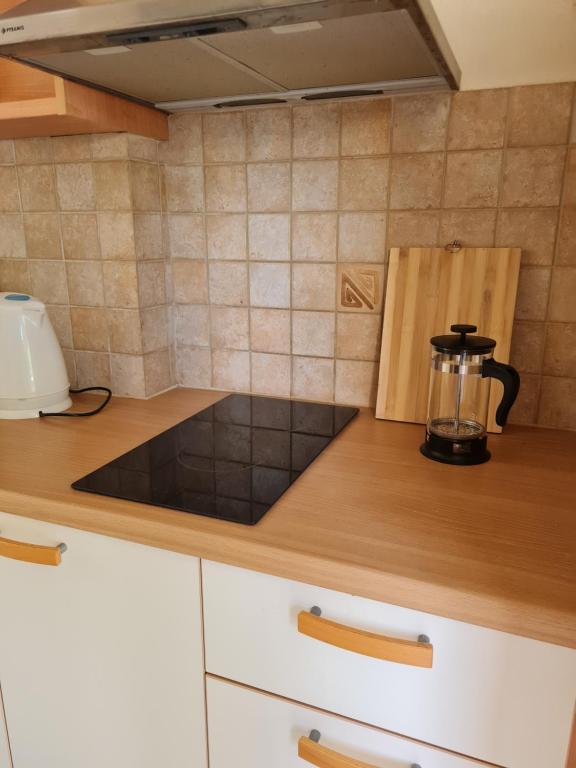 Kuchyň nebo kuchyňský kout v ubytování Paradise Sea View Pool Apartments Moraitika