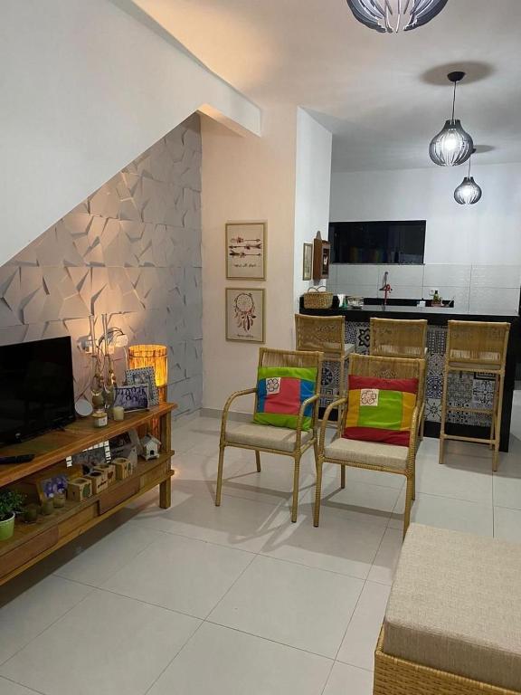 Et tv og/eller underholdning på Apto 2/4 apenas 1km do cento de arraial