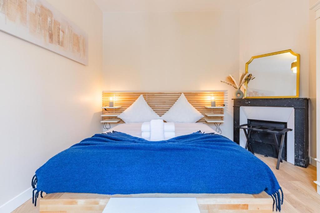 Postel nebo postele na pokoji v ubytování Plein Centre Enghien Les Bains 10 min de Paris