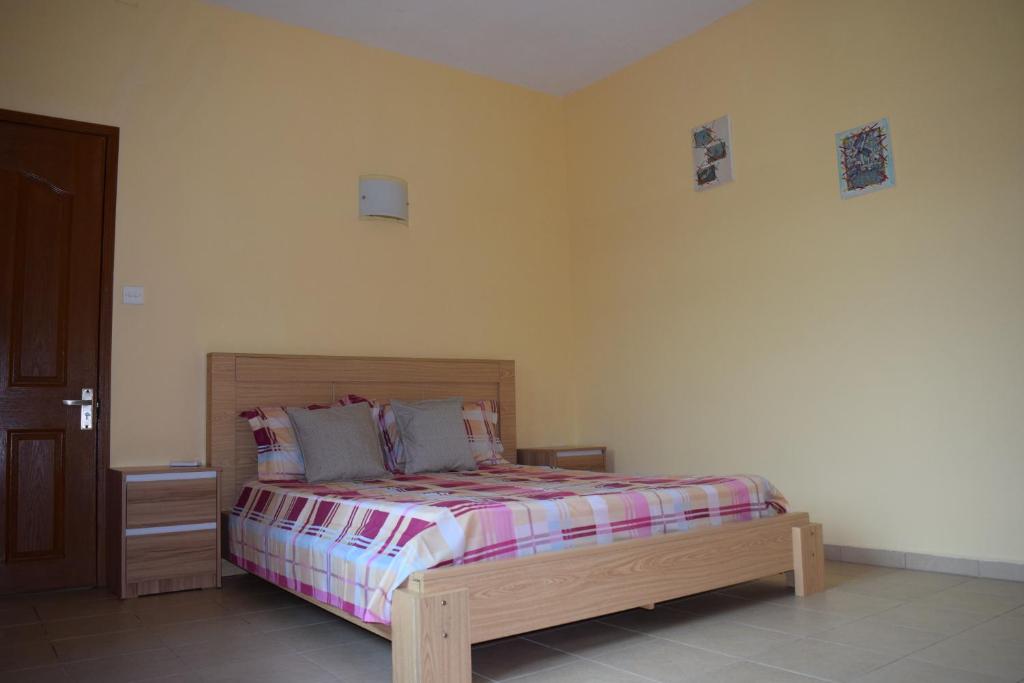 Postel nebo postele na pokoji v ubytování Baywatch Apartment