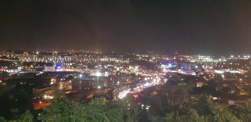 a view of a city at night with lights at studio Blue Honey 972 in Quartier Châteauboeuf