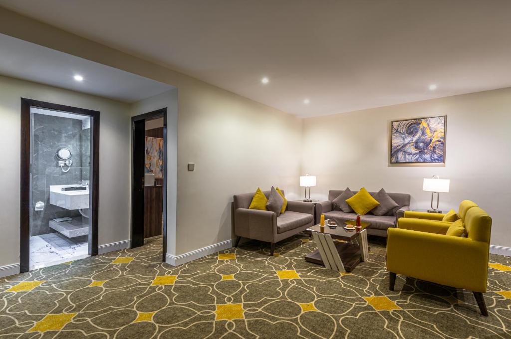 Posezení v ubytování Abha Gardn Millennium Hotel