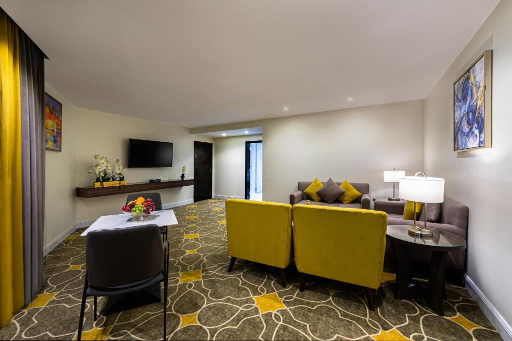 Posezení v ubytování Abha Gardn Millennium Hotel