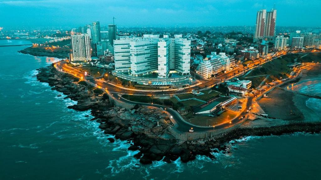 an aerial view of a city at night at Departamento frente al mar con cochera in Mar del Plata
