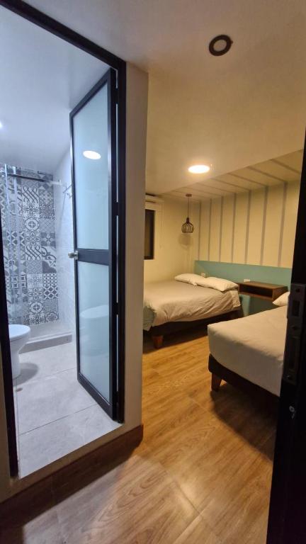 Postel nebo postele na pokoji v ubytování Casa Kutimuy