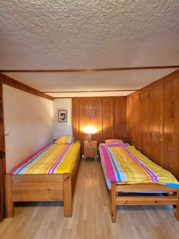 Postel nebo postele na pokoji v ubytování Apartments Saba & Jona