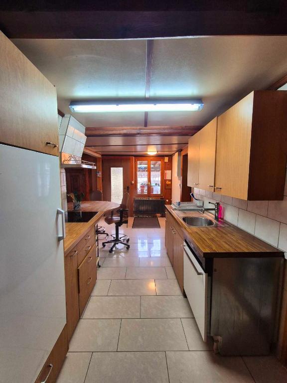 Kuchyň nebo kuchyňský kout v ubytování Apartments Saba & Jona
