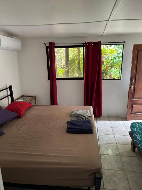 Postel nebo postele na pokoji v ubytování Pura Vida Hostel