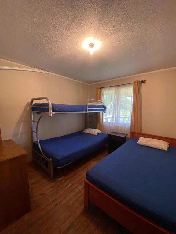 Postel nebo postele na pokoji v ubytování CASA A11 Lago Rapel