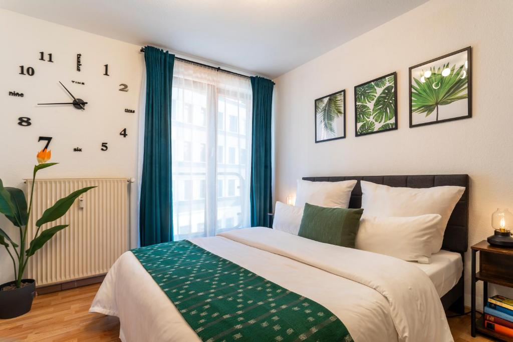 Ένα ή περισσότερα κρεβάτια σε δωμάτιο στο Modern Apartments Bremen with Netflix