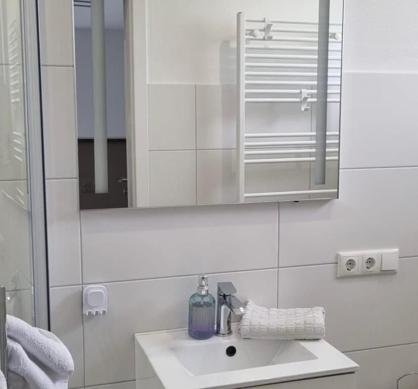 Koupelna v ubytování Ferienwohnung Weserflair nähe Herzzentrum