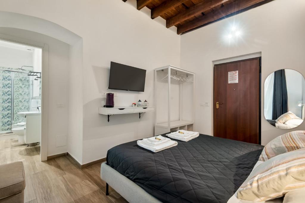 Postel nebo postele na pokoji v ubytování Cinque Terre Memory Affittacamere
