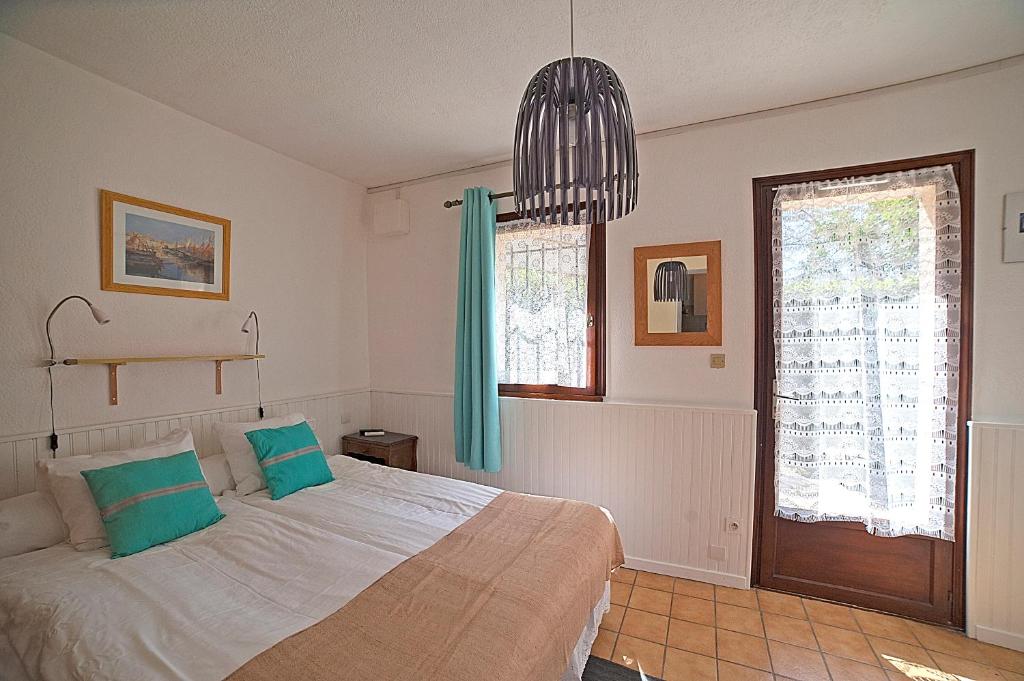 Postel nebo postele na pokoji v ubytování Hôtel Du Soleil
