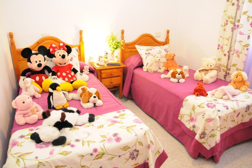 Posteľ alebo postele v izbe v ubytovaní EmyCanarias Holiday Homes Vecindario
