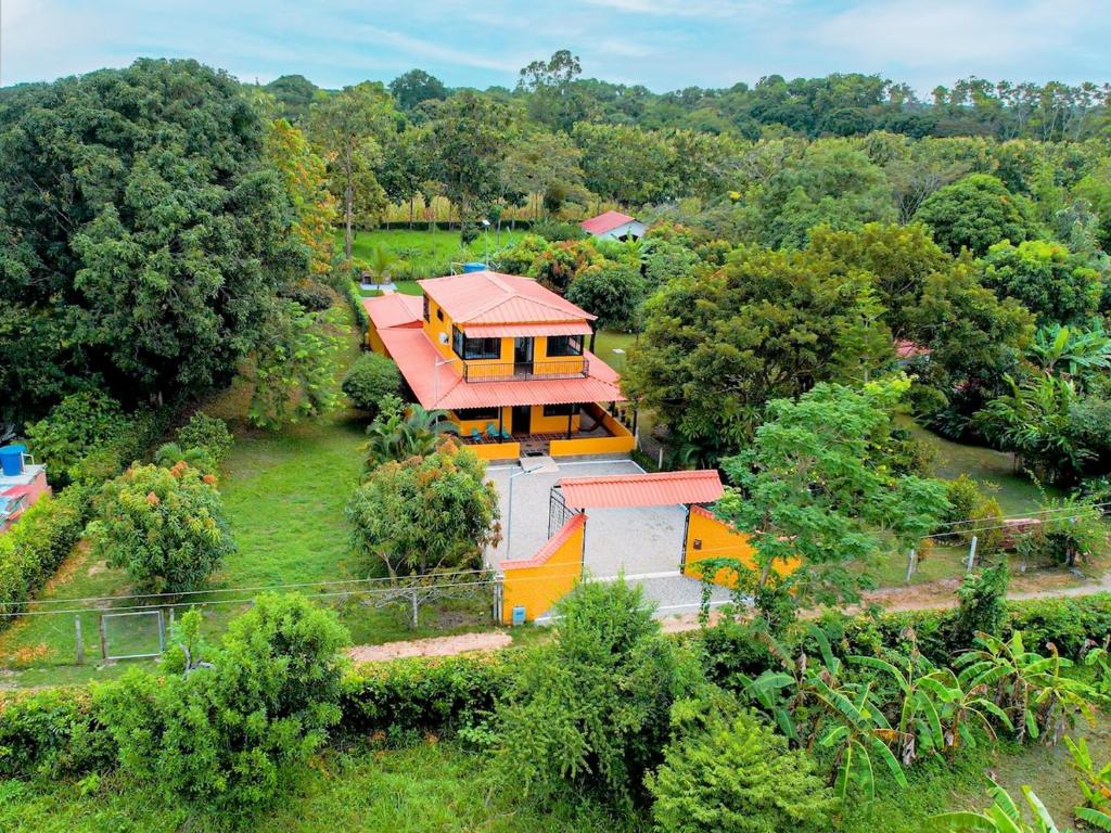 an overhead view of a house in a field at Cabaña Campestre Villa Valeria in Yopal