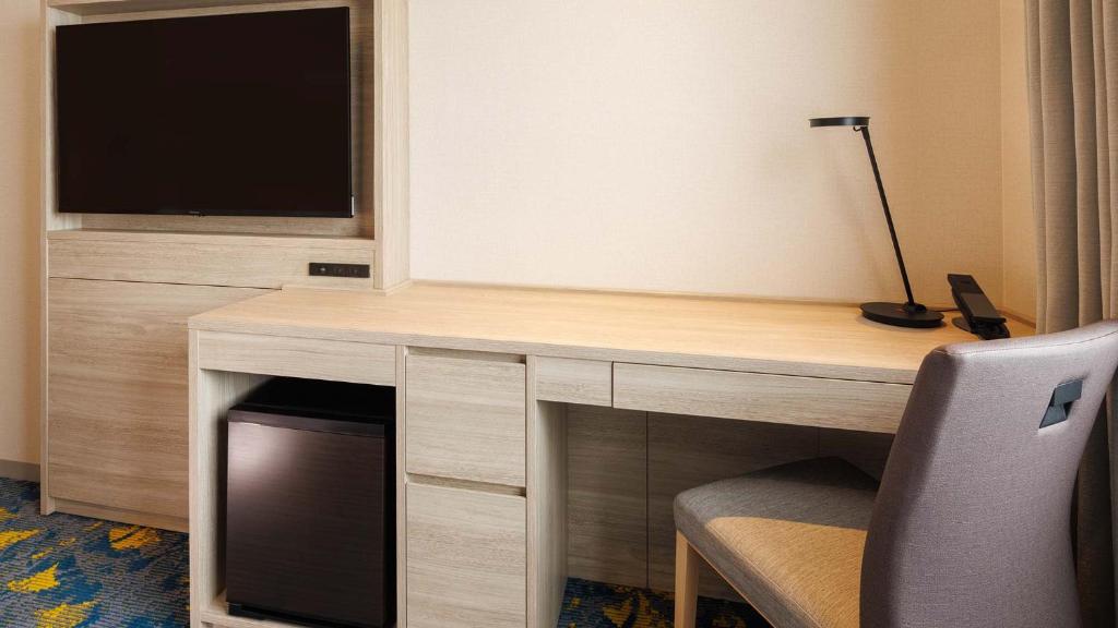 TV a/nebo společenská místnost v ubytování JR-East Hotel Mets Tachikawa
