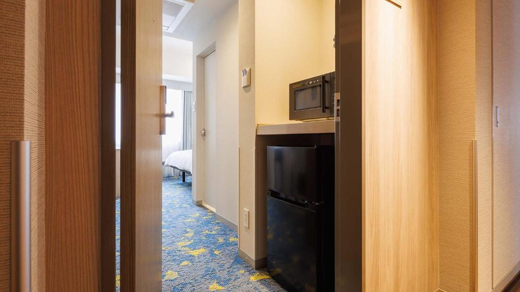 TV a/nebo společenská místnost v ubytování JR-East Hotel Mets Tachikawa