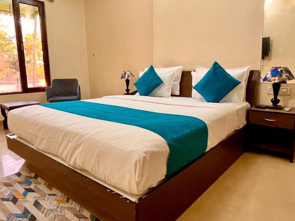 Postel nebo postele na pokoji v ubytování The southern Soul Beach Resort -close to calangute beach Managed By Shivam Resort