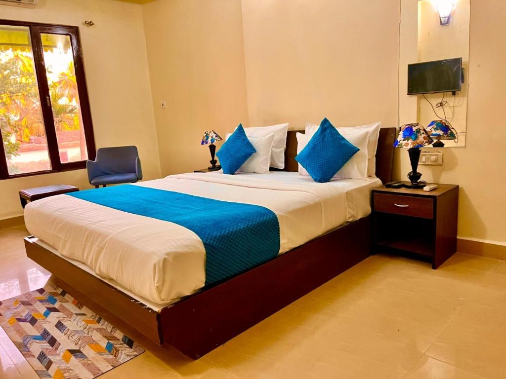 Postel nebo postele na pokoji v ubytování The southern Soul Beach Resort -close to calangute beach Managed By Shivam Resort
