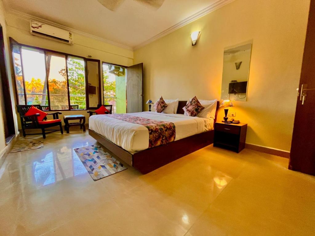 Postel nebo postele na pokoji v ubytování The southern Soul Beach Resort -close to calangute beach Managed By Shivam Resort