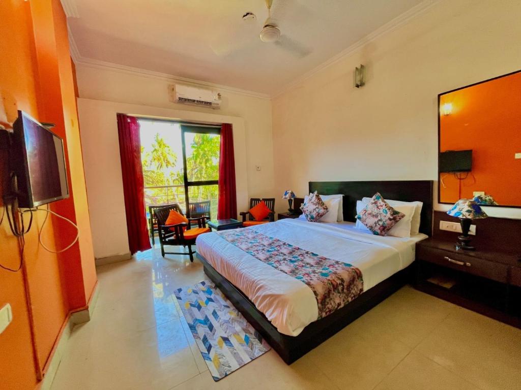 Postel nebo postele na pokoji v ubytování The southern Soul Beach Resort -close to calangute beach Managed By Shivam Resort