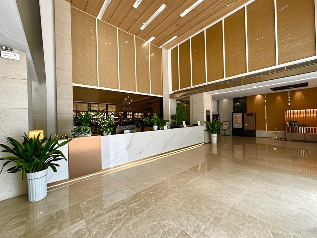 Vstupní hala nebo recepce v ubytování Yu Manju High-floor Huge-Screen Audiovisual Hotel-Guangzhou Tower Zhujiang New Town Sports West Road Branch