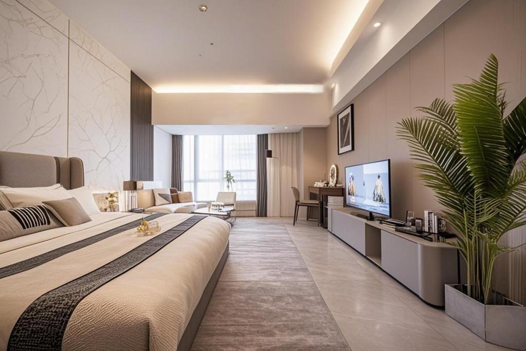 Postel nebo postele na pokoji v ubytování Yu Manju High-floor Huge-Screen Audiovisual Hotel-Guangzhou Tower Zhujiang New Town Sports West Road Branch