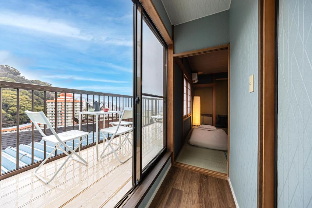 Balkón nebo terasa v ubytování nest Retreat Atami