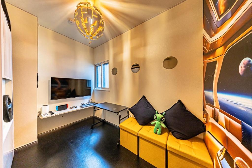 TV a/nebo společenská místnost v ubytování nest Retreat Atami