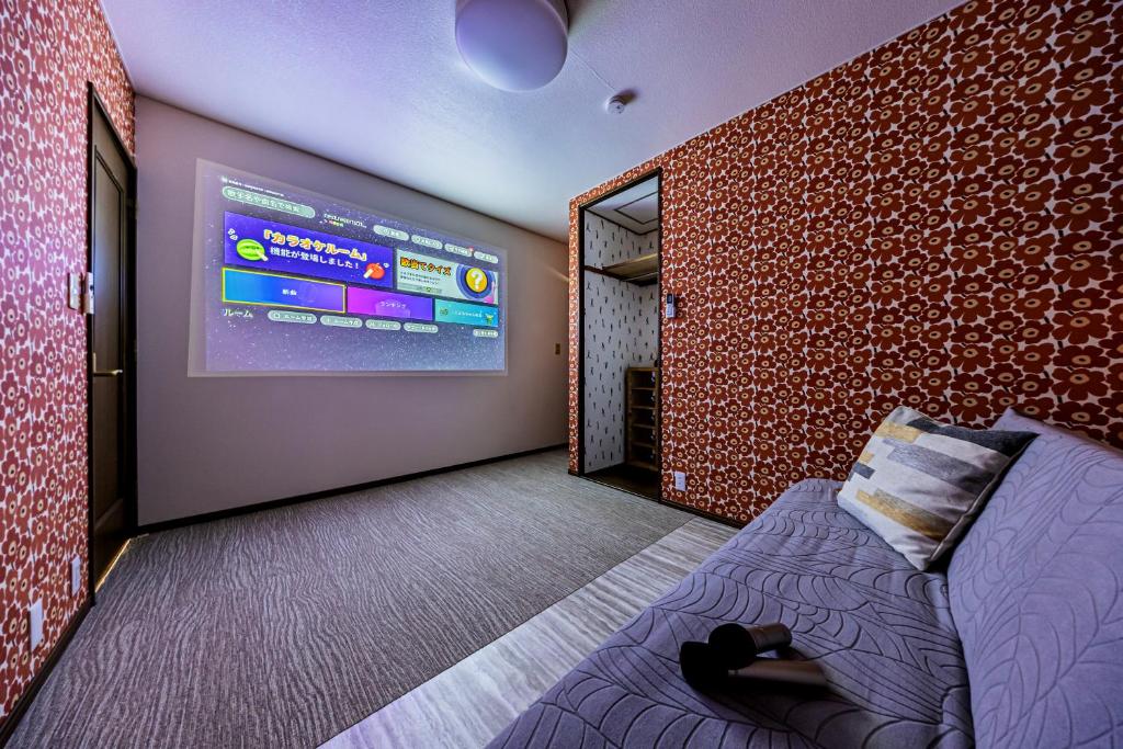 TV a/nebo společenská místnost v ubytování nest Retreat Atami