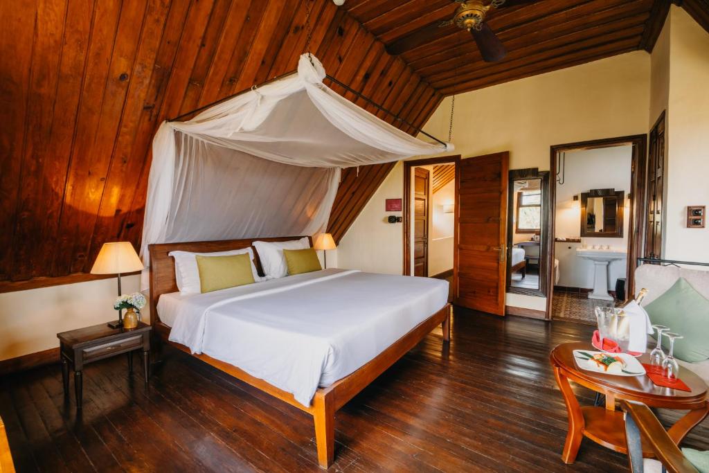 Postel nebo postele na pokoji v ubytování Ana Mandara Villas Dalat Resort & Spa